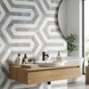 Modern white ceramic vessel sink with sleek black faucet on light oak floating vanity oriental white design with blue-gray marble mosaic