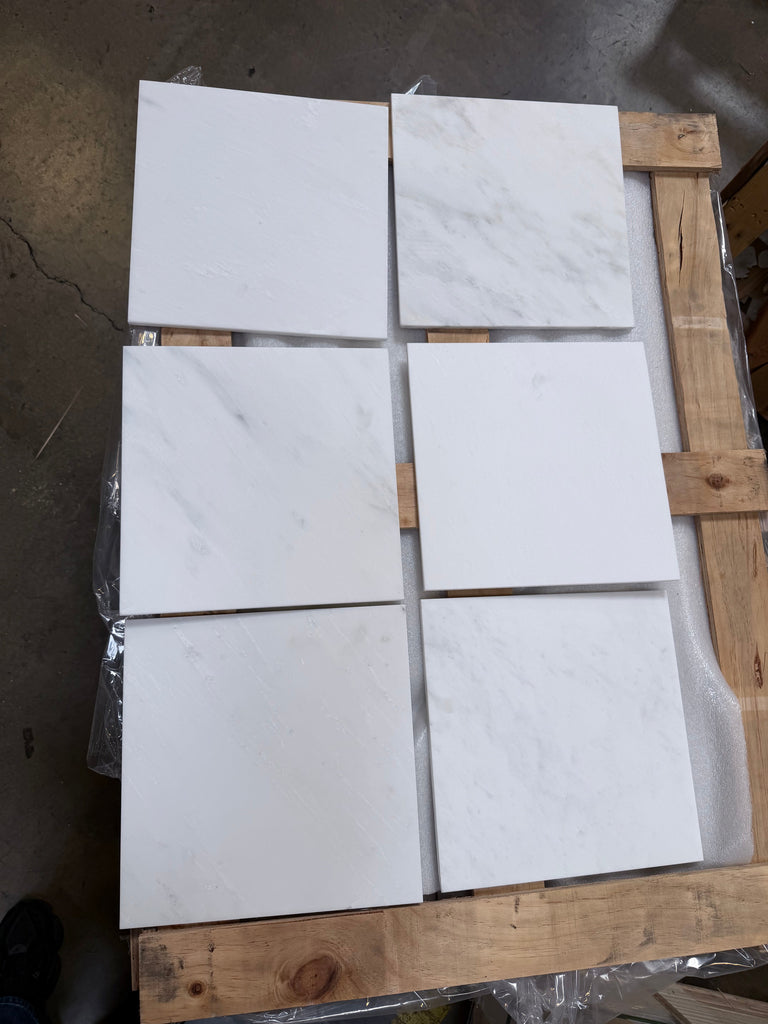 Six Oriental White marble 12x12 polished tiles on pallet