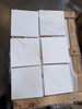 Six Oriental White marble 12x12 polished tiles on wooden pallet