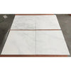 White marble tile with veining and natural patterns from Oriental White Asian Statuary Marble