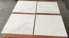 White marble tile with gray veining in polished finish from Oriental White Asian Statuary Marble 12x12 collection