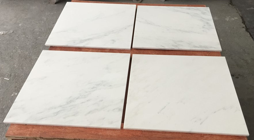 White marble tile with gray veining in polished finish from Oriental White Asian Statuary Marble 12x12 collection