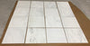 White marble tile floor mat with gray veining and grout lines from Oriental White Asian Statuary Marble 12X12