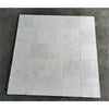 White marble tile arrangement of Oriental White Asian Statuary Marble 12X12 Tumbled