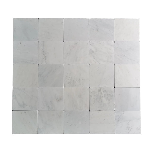 Square marble tile arrangement of Oriental White Asian Statuary Marble 12X12 Tumbled