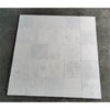White marble tile arrangement of Oriental White Asian Statuary Marble 12X12 Tumbled