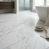 White marble-effect oriental white asian statuary marble 12x24 polished floor tiles with gray veining in herringbone pattern