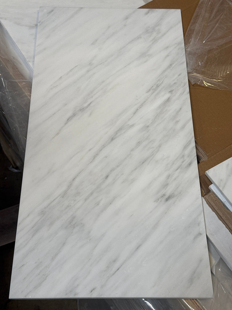 White marble-patterned slab with gray veining from Oriental White Asian Statuary Marble