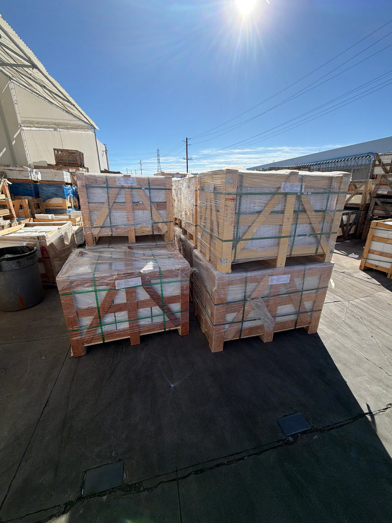 Oriental White Asian Statuary Marble 12x24 Polished slabs on strapped wooden pallets