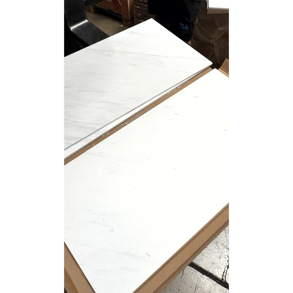 White marble-effect laminate flooring planks with subtle gray veining oriental white asian statuary marble 18x36 polished or honed