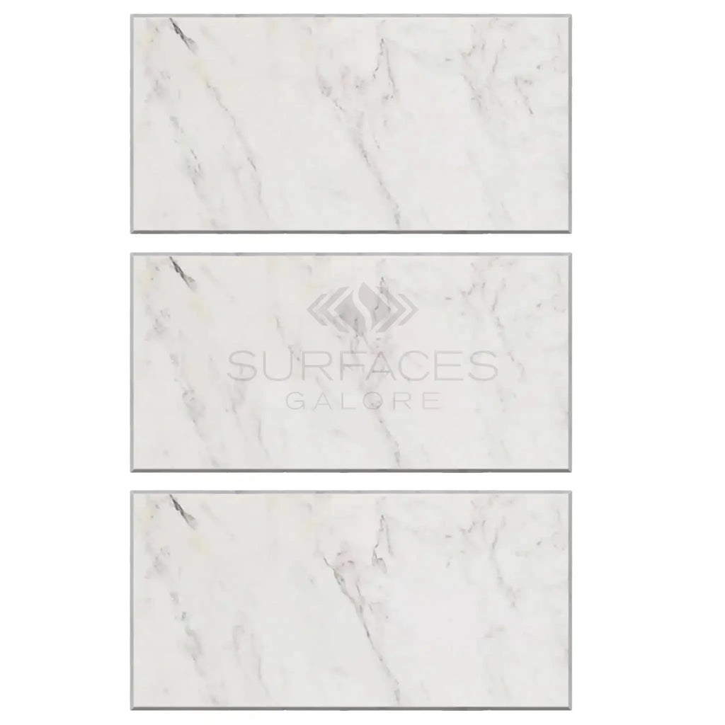 Three Oriental White / Asian Statuary Marble tiles showcasing a polished or honed finish