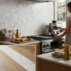 Oriental white asian statuary mini-versailles pattern marble mosaic with white marble subway tile backsplash and gray veining