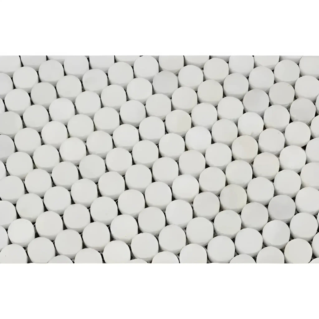 White circular mosaic tiles from Oriental White Asian Statuary marble collection