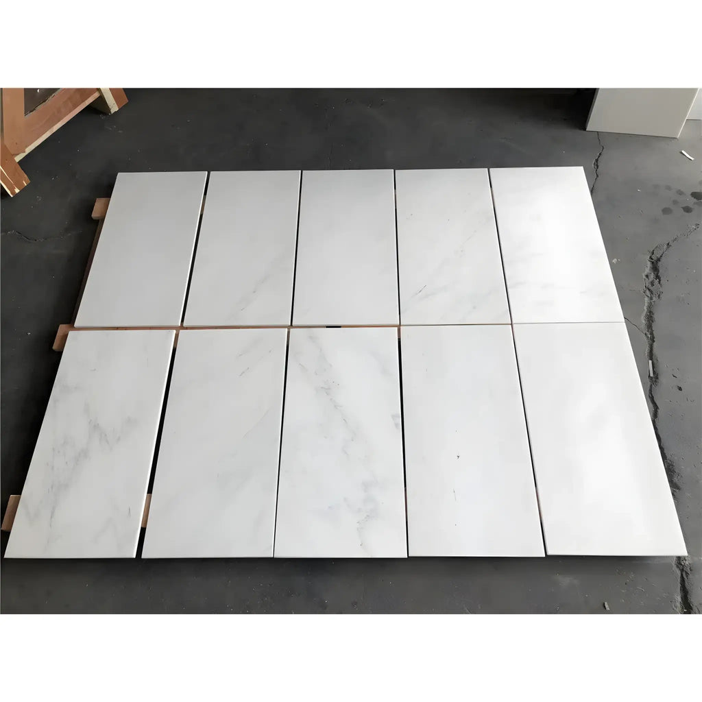 Rectangular white marble tiles in Oriental White Asian Statuary Vortex hexagon mosaic