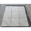 Nine marble-patterned square tiles from Oriental White Asian Statuary Vortex Mosaic