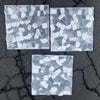 Three square mosaic tile sheets in Pebble Mosaic Dolomite Bardiglio and Palissandro tones