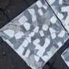 Pebble Mosaic sheet featuring Dolomite Bardiglio and Palissandro tumbled stone tiles