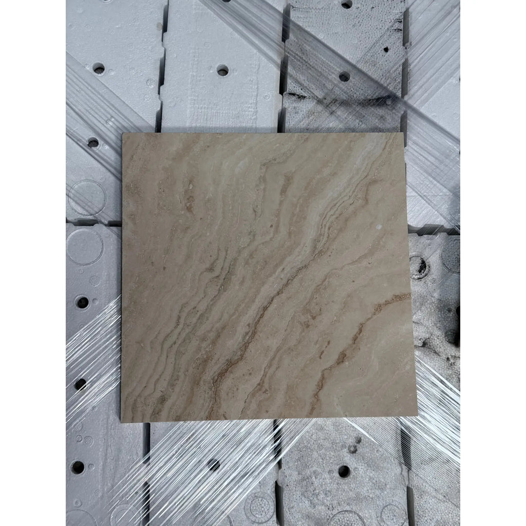 Square tile with swirling beige and brown pattern from Philadelphia Travertine 12X12 collection
