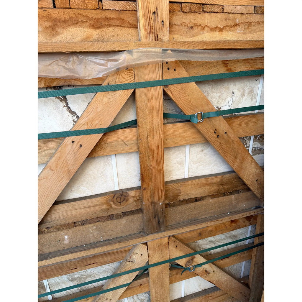 Philadelphia Travertine 18X18 Filled and Honed with wooden beam structure secured by green straps