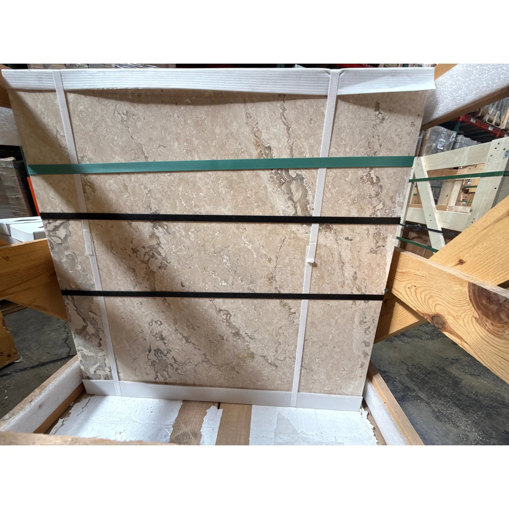 Philadelphia Travertine 24x24 filled and honed stone slabs secured with straps