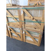Wooden crates containing Philadelphia Travertine 24X24 Filled and Honed stone tiles