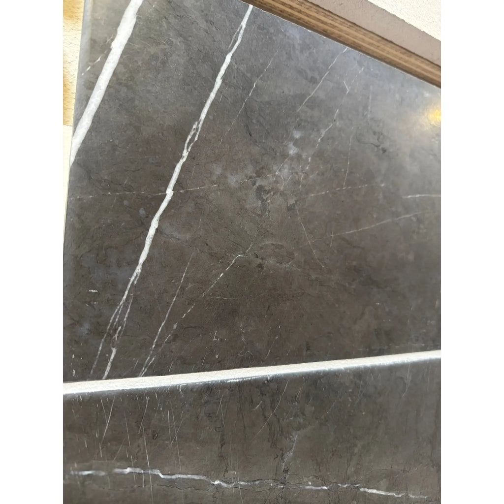 Pietra Notte dark gray marble 12x24 tile with elegant white veining