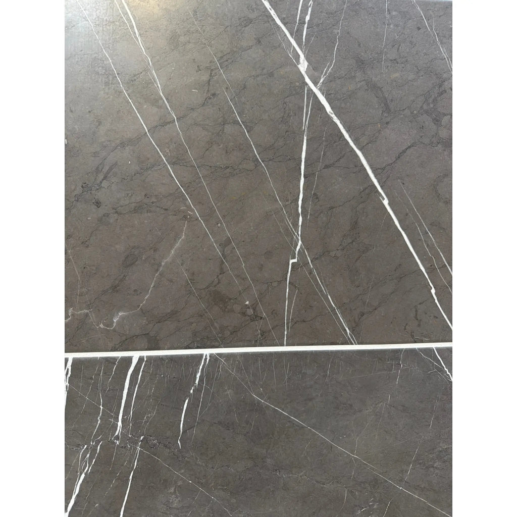 Dark gray Pietra Notte Marble 12x24 tile with elegant white veining