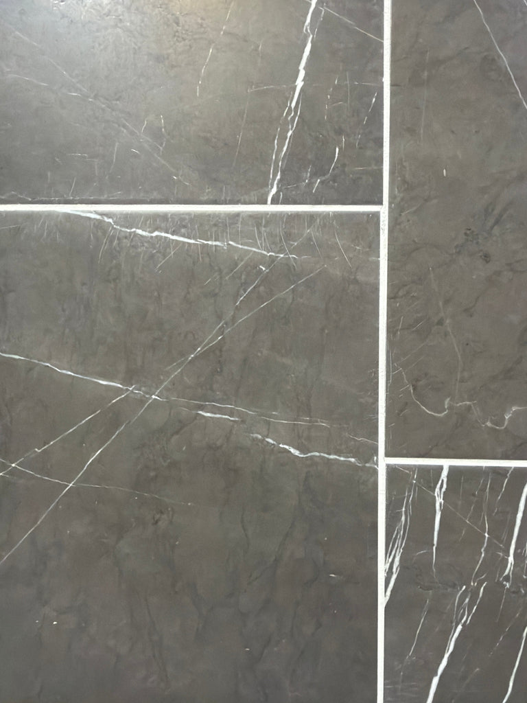 Pietra Notte dark gray marble 16x24 tiles with white veining