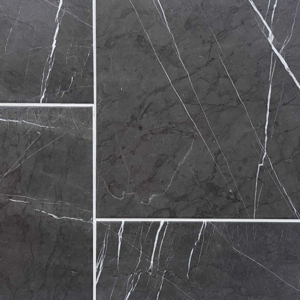 Pietra Notte marble 24x24 tile in dark gray with elegant white veining