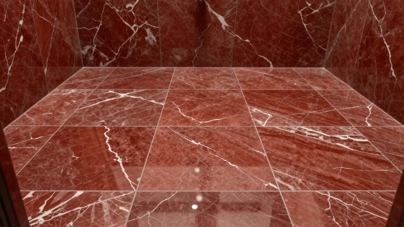 Rojo Alicante marble tiles on a bathroom floor.