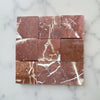 Reddish-brown marble tiles with white veining in a 4x4 grid for Rojo Alicante Tumbled