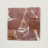 Nine reddish-brown Rojo Alicante 4X4 Tumbled marble tiles with white veining