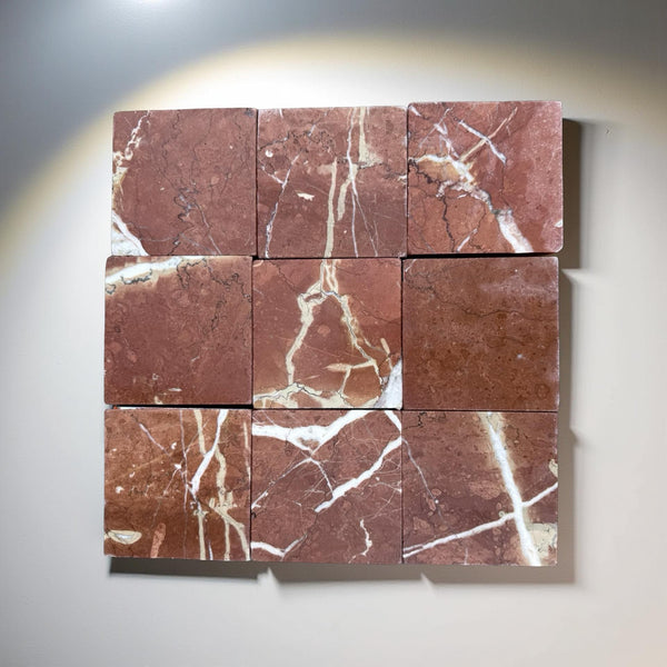 Nine square Rojo Alicante 4X4 tumbled red marble tiles with white veining