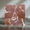 Nine reddish-brown marble tiles with white and beige veining for Rojo Alicante 4X4 Tumbled
