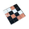 Checkerboard marble tile pattern of Rojo Alicante, Carrara White, and Nero Marquina Mosaic