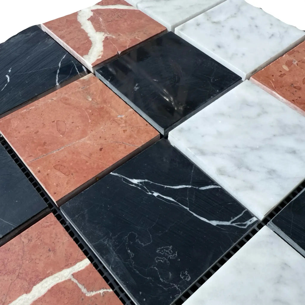 Checkerboard marble tile pattern in Rojo Alicante, Carrara White, and Nero Marquina mosaic