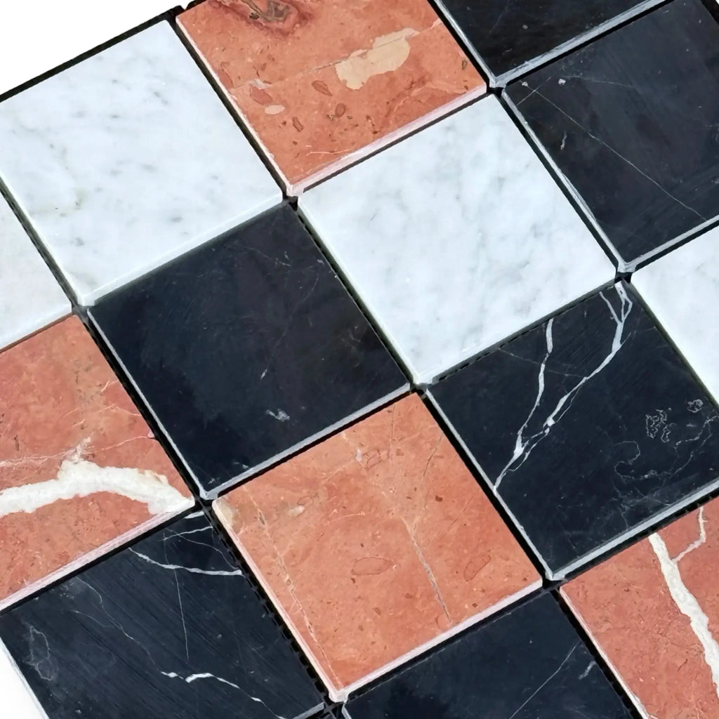 Checkerboard marble tile pattern of Rojo Alicante, Carrara White, and Nero Marquina mosaic