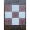 Checkerboard pattern of square tiles from Rojo Alicante Marble 12X12 Tumbled product