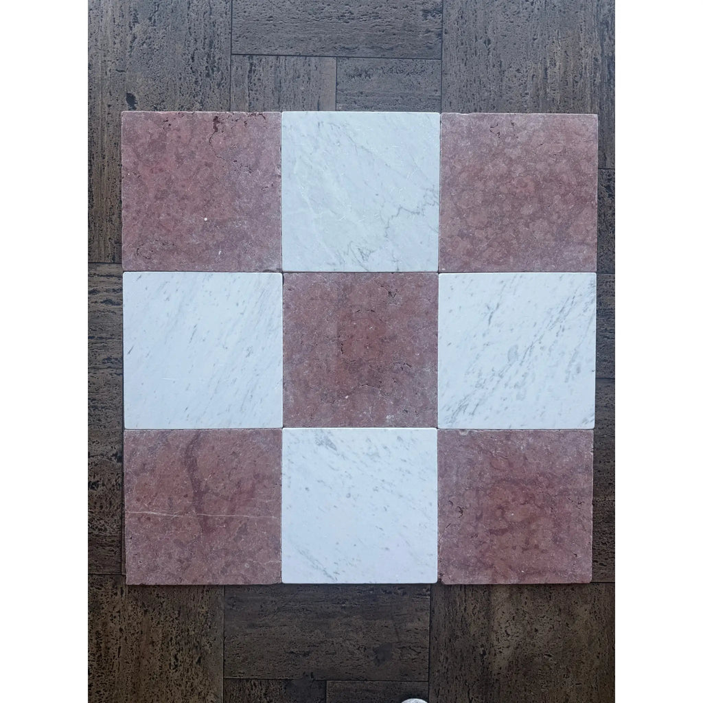 Checkerboard pattern of square tiles from Rojo Alicante Marble 12X12 Tumbled product
