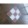 Checkerboard tile pattern on Rojo Alicante Marble 12x12 Tumbled flooring