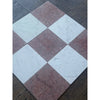 Red and white marble tiles arranged in an alternating pattern for Rojo Alicante Marble 12X12 Tumbled