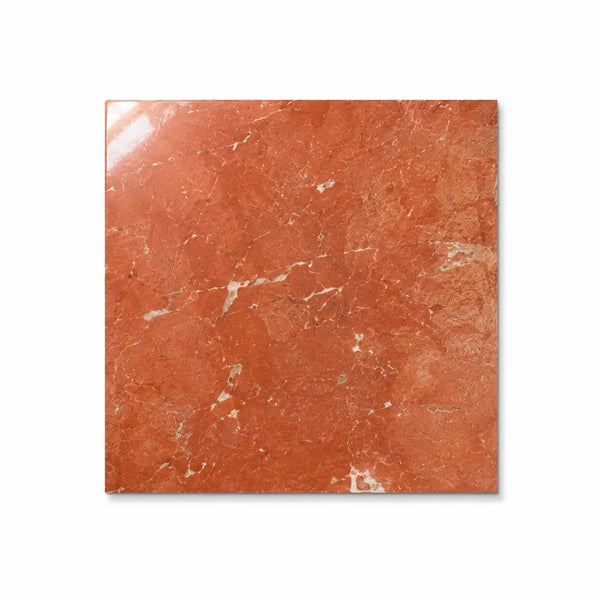A square glossy orange rojo alicante marble tile with subtle white veining in 18x18 honed polished finish