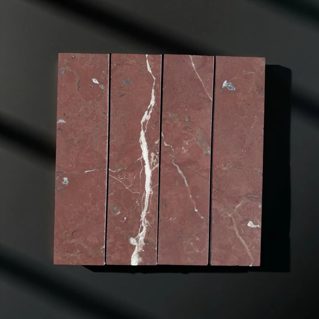 Red marble tile arrangement featuring Rojo Alicante Marble 3 X 12 Field Tile