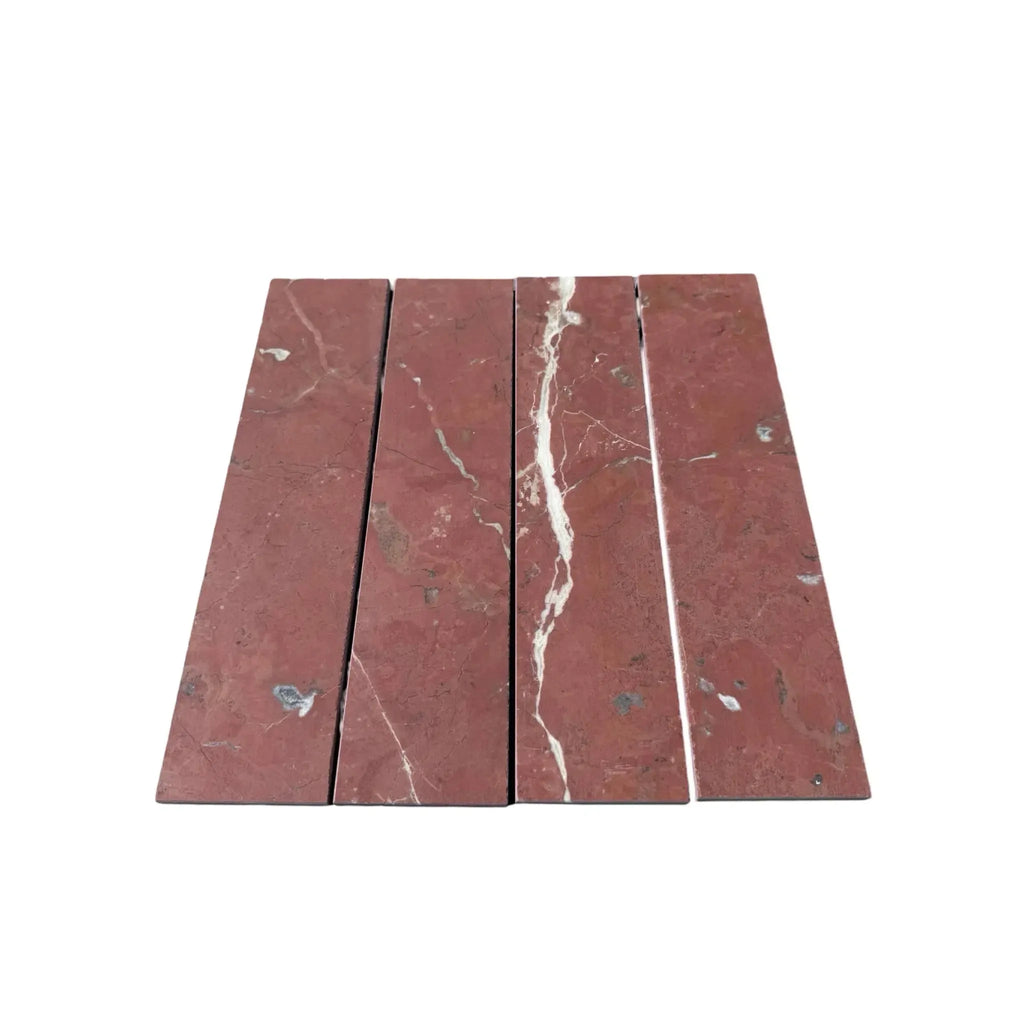 Red marble tiles with white veining in Rojo Alicante Marble 3 X 12 Field Tile