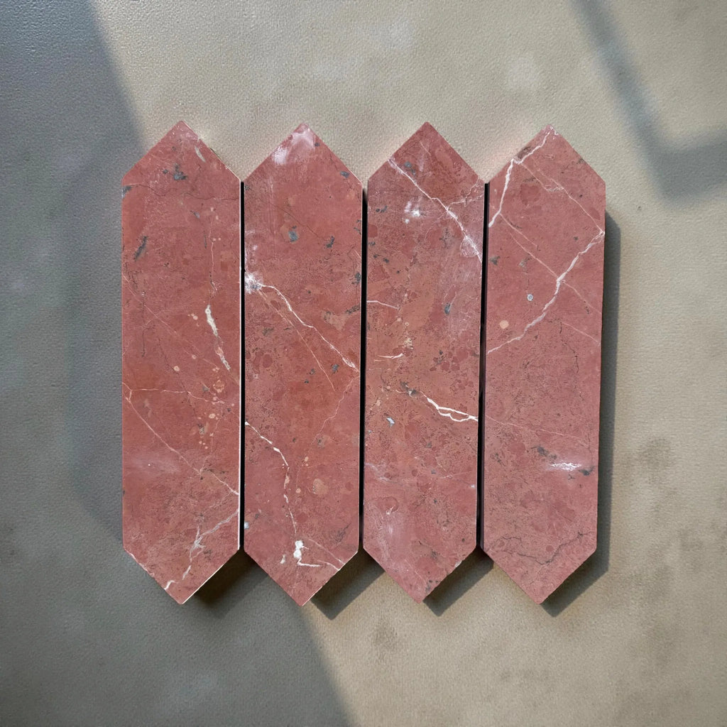 Four red marble arrow tiles from Rojo Alicante Marble 3’’ X 12’’ Picket Mosaic