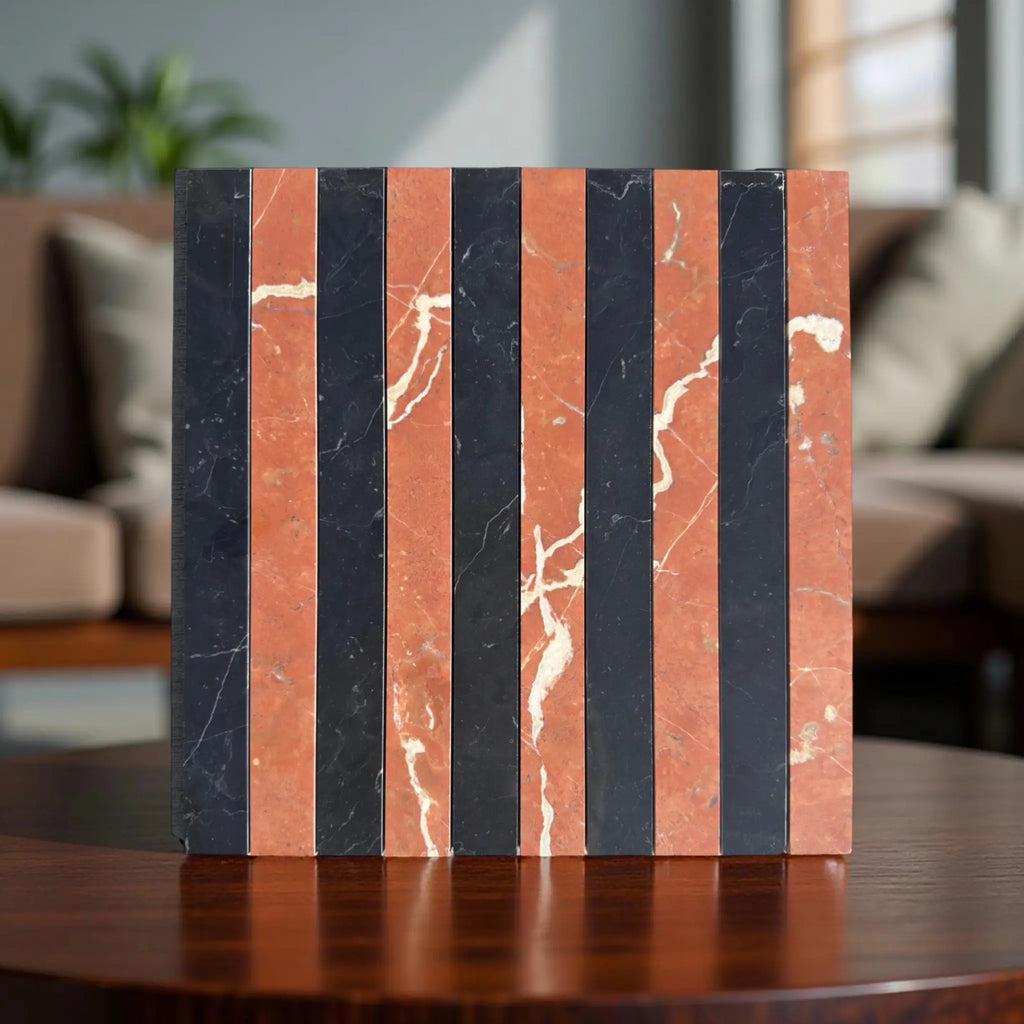 Striped marble block of Rojo Alicante and Nero Marquina in a mosaic design