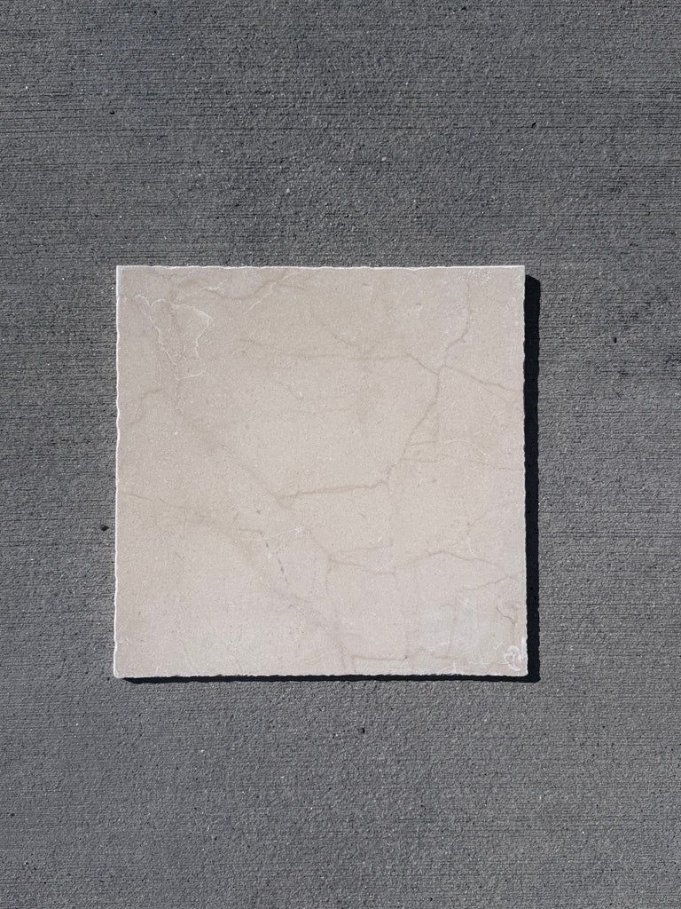 Cream-colored Rojo Alicante Rustic Modern Tumbled tile with gray veining