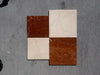 Four Rojo Alicante Rustic Modern Tumbled marble tiles in reddish-brown and off-white
