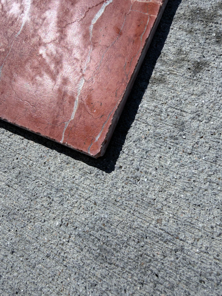 Rojo Alicante Rustic Modern Tumbled red stone slab with white veining