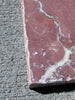 Rojo Alicante Rustic Modern Tumbled reddish-pink marble slab with white veining